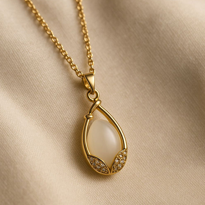 Elegant Teardrop Pendant Necklace in Gold with Crystals