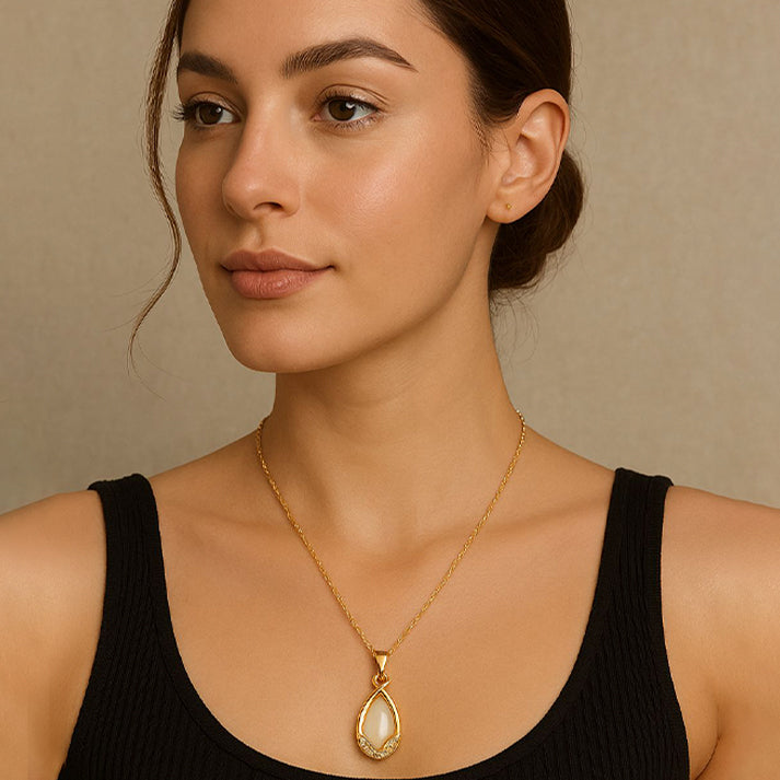Elegant Teardrop Pendant Necklace in Gold with Crystals